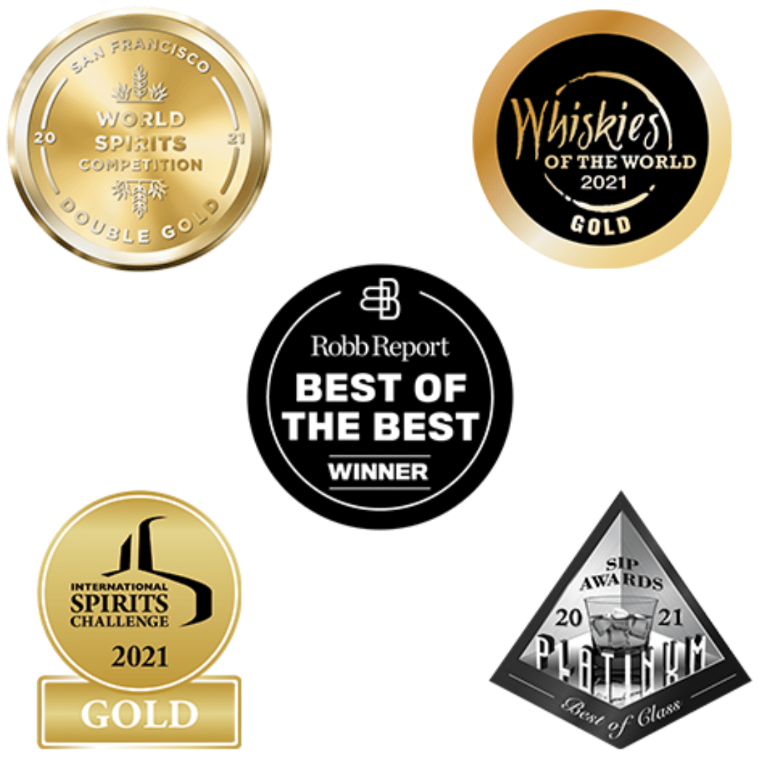 A collage of award labels for a whiskey brand called Phpaidisco. The labels include awards from competitions such as World Whiskies of the World 2021, World Spirits Competition 2021, International Spirits Challenge 2021, and Robb Report Best of the Best 2021.