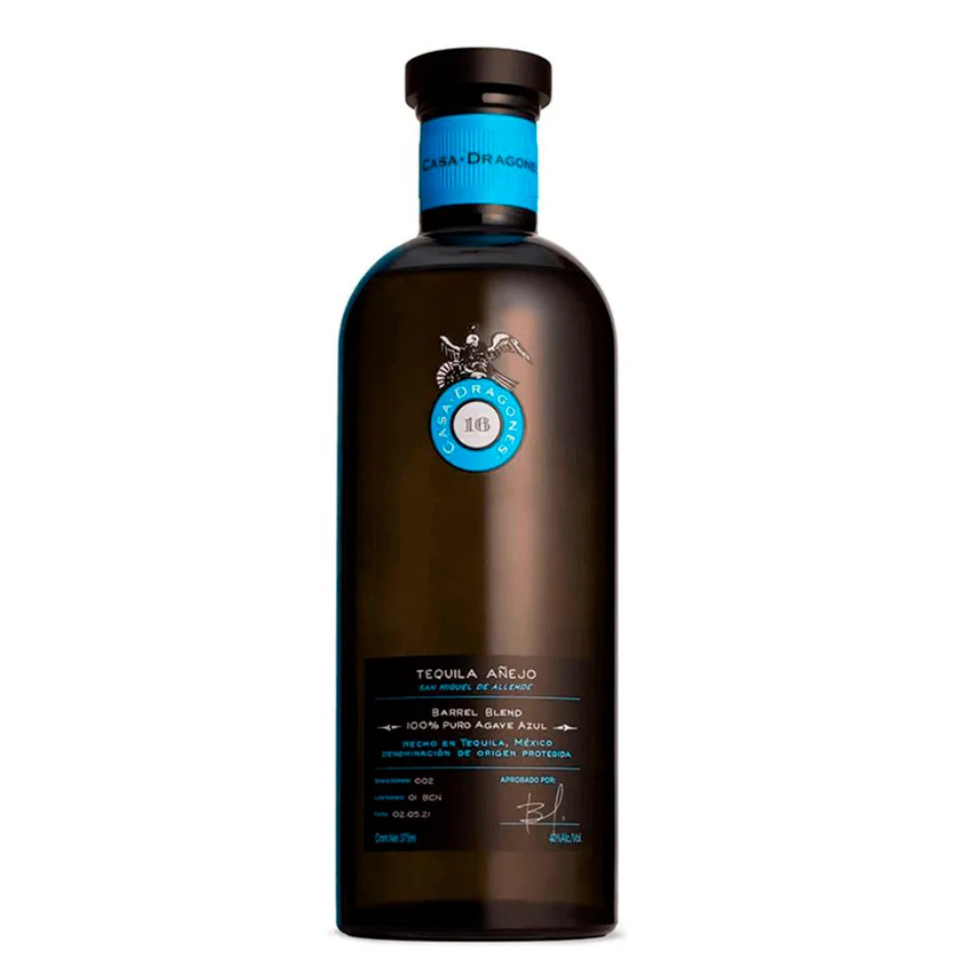 A bottle of Tequila Agrio by Patrón, featuring a dark brown glass bottle with a black cap and a blue and white label, set against a plain white background.