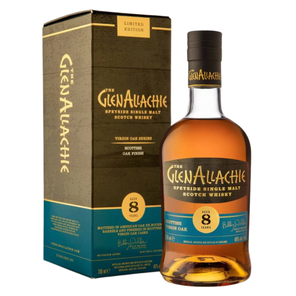 A photo of a bottle of GlenAllachie 8 Year Old Speyside single malt scotch whisky in a box. The bottle label is dark blue with gold lettering. It includes the brand name "GlenAllachie," the age statement "8 Year Old" and "Speyside Single Malt Scotch Whisky." There is also text about "Virgin Oak Finish" and "Matured in Oak casks." The box is light brown cardboard with gold lettering that says "GlenAllachie" and "Limited Edition."